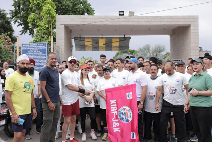 Joint Director of Tourism, Aijaz Qaisar, along with other officials, during the flag-off ceremony of Jammu Walkathon. Joint Director of Tourism, Aijaz Qaisar, along with other officials, during the flag-off ceremony of Jammu Walkathon.
