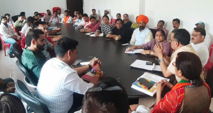 BJP Seh Prabhari Sanjay Baru addressing a meeting at Kathua on Tuesday.
