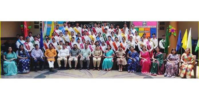 Newly elected students council posing along with dignitaries during a programme.