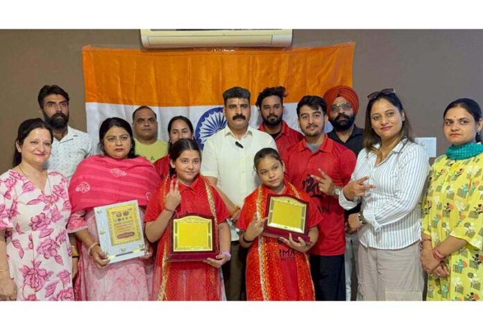 Dancers from Udhampur who have been selected to represent the region in International Dance Competition at Nepal posing for a photograph with senior leaders of Udhampur after their felicitation on Saturday. Dancers from Udhampur who have been selected to represent the region in International Dance Competition at Nepal posing for a photograph with senior leaders of Udhampur after their felicitation on Saturday.