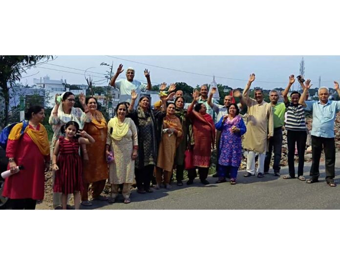 Residents of Upper Roop Nagar staging a protest in Jammu. Residents of Upper Roop Nagar staging a protest in Jammu.