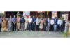 Representatives of different Universities posing along with management.