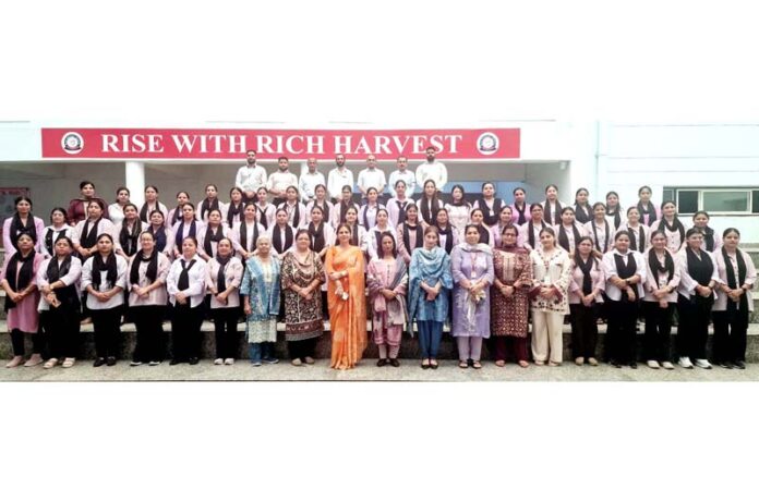 School Management posing for group photograph during a programme. School Management posing for group photograph during a programme.