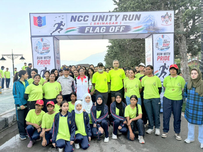 Runners posing for a group photograph during the NCC Unity Run in Srinagar. Runners posing for a group photograph during the NCC Unity Run in Srinagar.