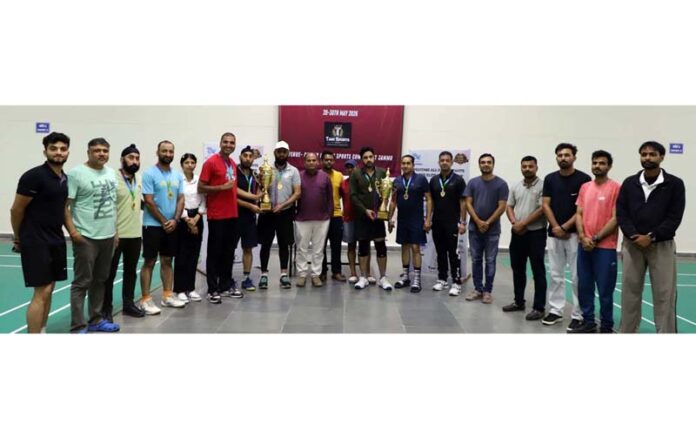 Winners posing along with dignitaries during a programme. Winners posing along with dignitaries during a programme.