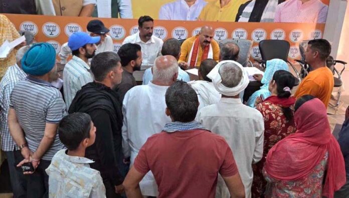 BJP MLA, Jammu East, Yudhvir Sethi holding a public darbar at Jammu on Thursday. BJP MLA, Jammu East, Yudhvir Sethi holding a public darbar at Jammu on Thursday.