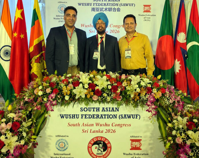Newly elected President of South Asian Wushu Federation Bhupender Singh Bajwa posing along with J&K's Vijay Saraf and Kuldeep Handoo during a programme in Sri Lanka.
