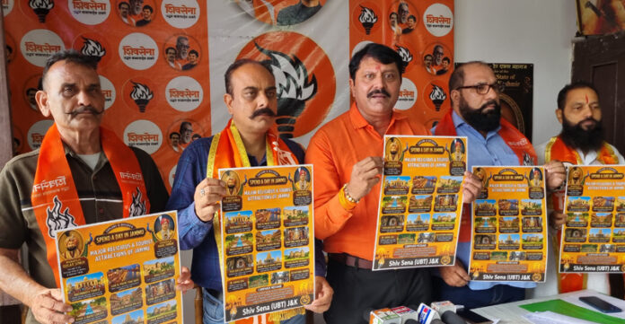 Shiv Sena leaders releasing a poster in Jammu on Saturday. Shiv Sena leaders releasing a poster in Jammu on Saturday.