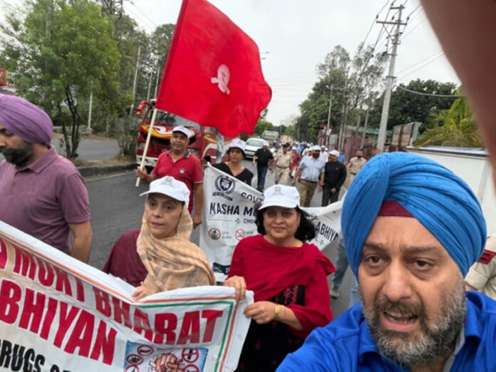 Faculty and staff members of IGGDC Jammu taking out a rally in Jammu on Saturday.