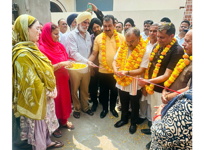Choudhary Vikram Randhawa inaugurating development works at Digiana area in Jammu district on Saturday.
