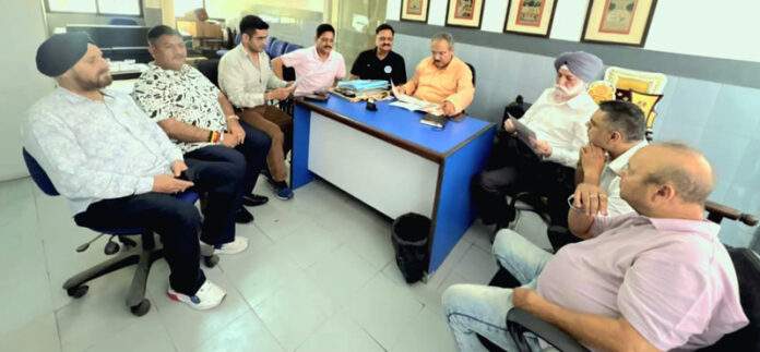 Members of Tourism Federation of Jammu during a meeting on Friday.