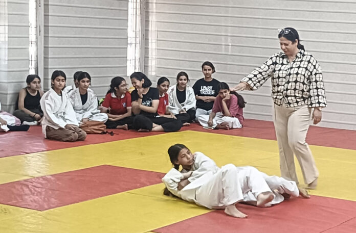 Girls in action during a match at MA Stadium Jammu.