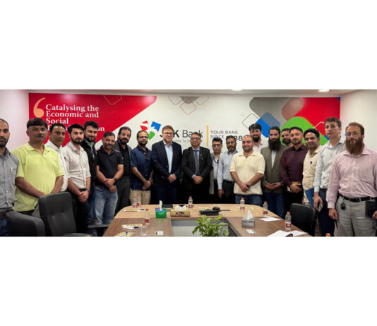 Representatives of major automobile brands and J&K Bank officials at Bank's Corporate Headquarters in Srinagar on Wednesday.