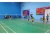 Badminton players in action during a match in Jammu.