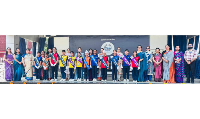 Newly elected students council posing along with dignitaries during a programme.