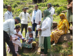 Doctors examining patients at border village Dadote in Mendhar sector.