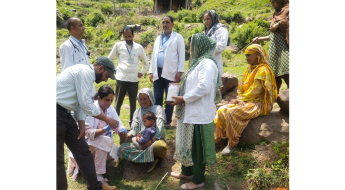 Doctors examining patients at border village Dadote in Mendhar sector.