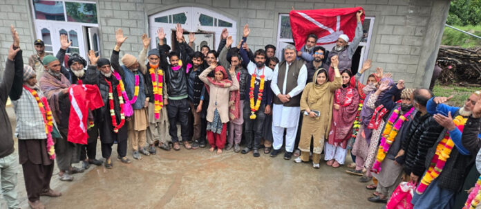 MLA Banihal, Sajjad Shaheen along with others during a tour of Mahakund area of Gool on Monday.