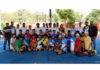 Players posing along with dignitaries during a programme.