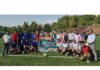 Football teams posing with dignitaries during the final match of Rajouri Football League at BGSBU, Rajouri. — Excelsior/Imran