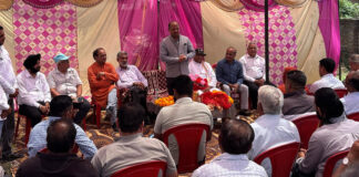 MLA Ramgarh, Dr. Devinder Kumar Manyal addressing a gathering after starting work on vital roads in his constituency.