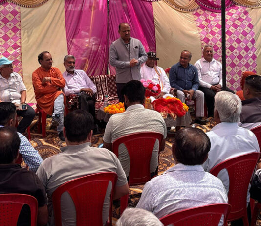 MLA Ramgarh, Dr. Devinder Kumar Manyal addressing a gathering after starting work on vital roads in his constituency.