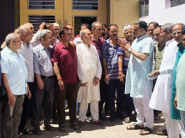 Former councillor and senior BJP leader, Sanjay Baru listening the grievances of people of Anand Nagar, Bohri on Thursday.