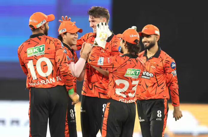 SRH players celebrating after defeating PBKS in IPL match in Hyderabad.