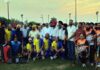 Hockey players posing with dignitaries during inauguration ceremony at Gole Gujral, Jammu.