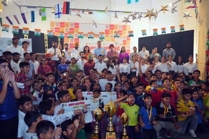 Participants posing along with dignitaries during an event.