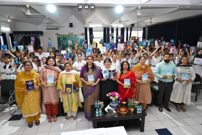 Dignitary along with school management posing during a programme.