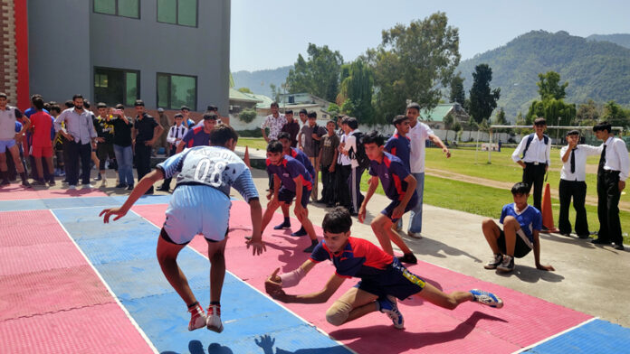 Players in action during a match in Poonch. Players in action during a match in Poonch.