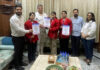 President J&K Olympic Association, Dushyant Sharma felicitating the medal winners.