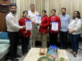 President J&K Olympic Association, Dushyant Sharma felicitating the medal winners.