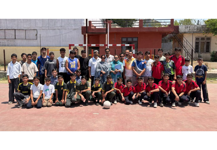 Players posing along with dignitaries during a programme.