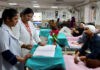 Nurses attend to patients in a hospital ward on the occasion of International Nurses Day, in Jammu on Tuesday. (UNI)