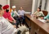 BJP leaders listening public grievances at Trikuta Nagar party Headquarters on Tuesday.