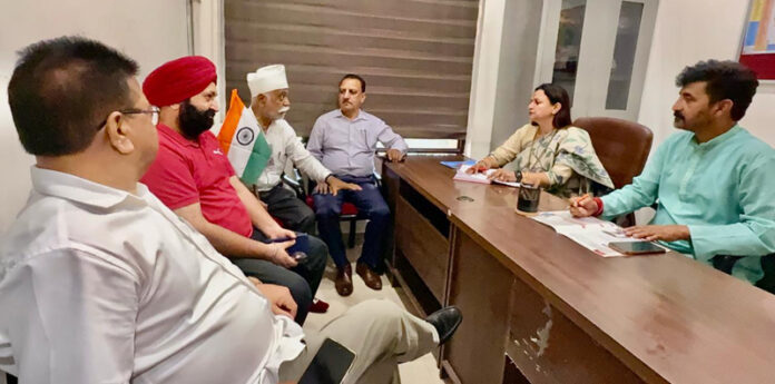 BJP leaders listening public grievances at Trikuta Nagar party Headquarters on Tuesday.