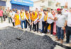 MLA Bahu, Ch Vikram Randhawa kick starting blacktopping work on Belicharana-Raipur Satwari road in Jammu on Tuesday.