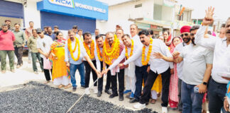MLA Bahu, Ch Vikram Randhawa kick starting blacktopping work on Belicharana-Raipur Satwari road in Jammu on Tuesday.