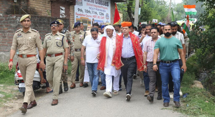 Mahant Baba Yashpal and Sanjeev Verma (Chief Electoral Officer, J&K) leading an awareness march at Jandiyal in Nagrota Constituency.