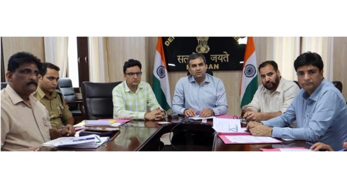 DC Ramban chairing a meeting on Friday.