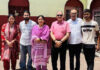 HP Governor Kavinder Gupta with the family members of late Pt Prem Nath Dogra in Jammu on Monday.