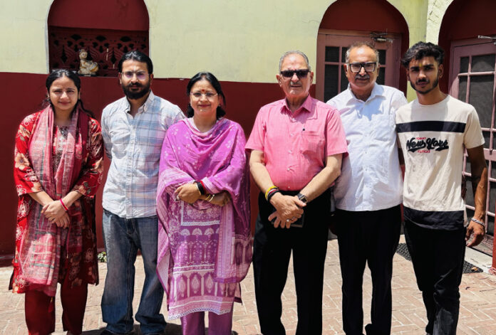 HP Governor Kavinder Gupta with the family members of late Pt Prem Nath Dogra in Jammu on Monday. HP Governor Kavinder Gupta with the family members of late Pt Prem Nath Dogra in Jammu on Monday.
