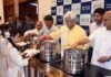 LG Manoj Sinha serving mid-day meal among the students in Katra on Thursday.