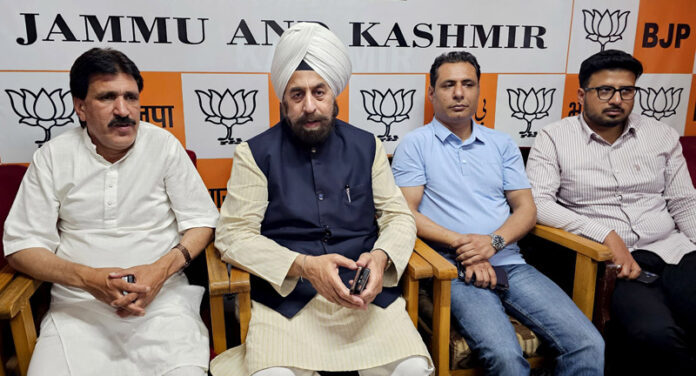 BJP national spokersperson R.P. Singh along with other party leaders during a press conference in Srinagar on Monday. — Excelsior/Shakeel BJP national spokersperson R.P. Singh along with other party leaders during a press conference in Srinagar on Monday. — Excelsior/Shakeel