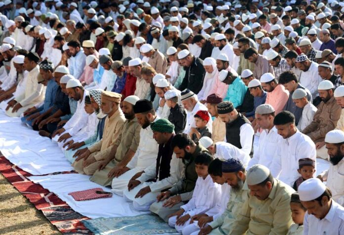 Members of Muslim community offering special Eid prayers at Eidgah Residency Road Jammu on Wednesday -Excelsior/Rakesh Members of Muslim community offering special Eid prayers at Eidgah Residency Road Jammu on Wednesday -Excelsior/Rakesh