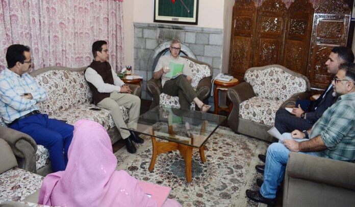 CM interacting with a depuation at Srinagar on Friday.