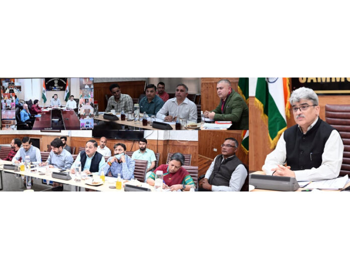 CS chairing a meeting at Srinagar on Monday.