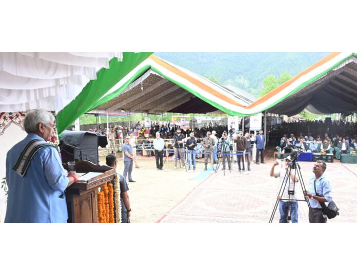 LG addressing a public gathering at Vibrant Village Trehgam in Kupwara on Wednesday.